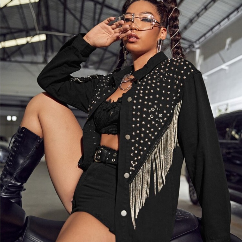 Black denim studded, crystal fringe jacket.
